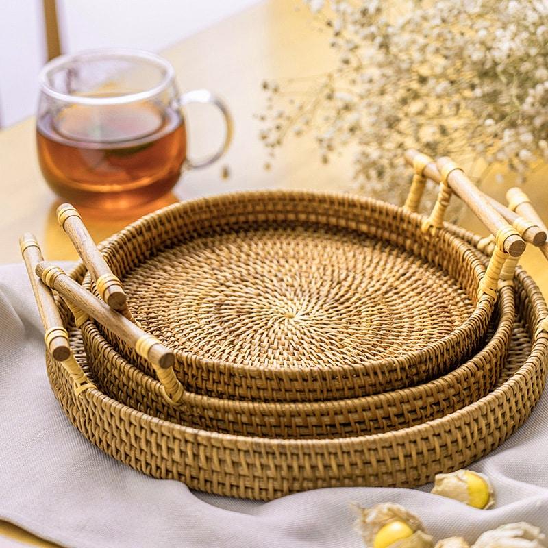 Light beige rattan serving tray with solid wood handles – shown in a room setting (3)