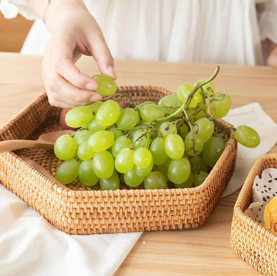 Hexagonal woven rattan tray with crisp angles – shown in use