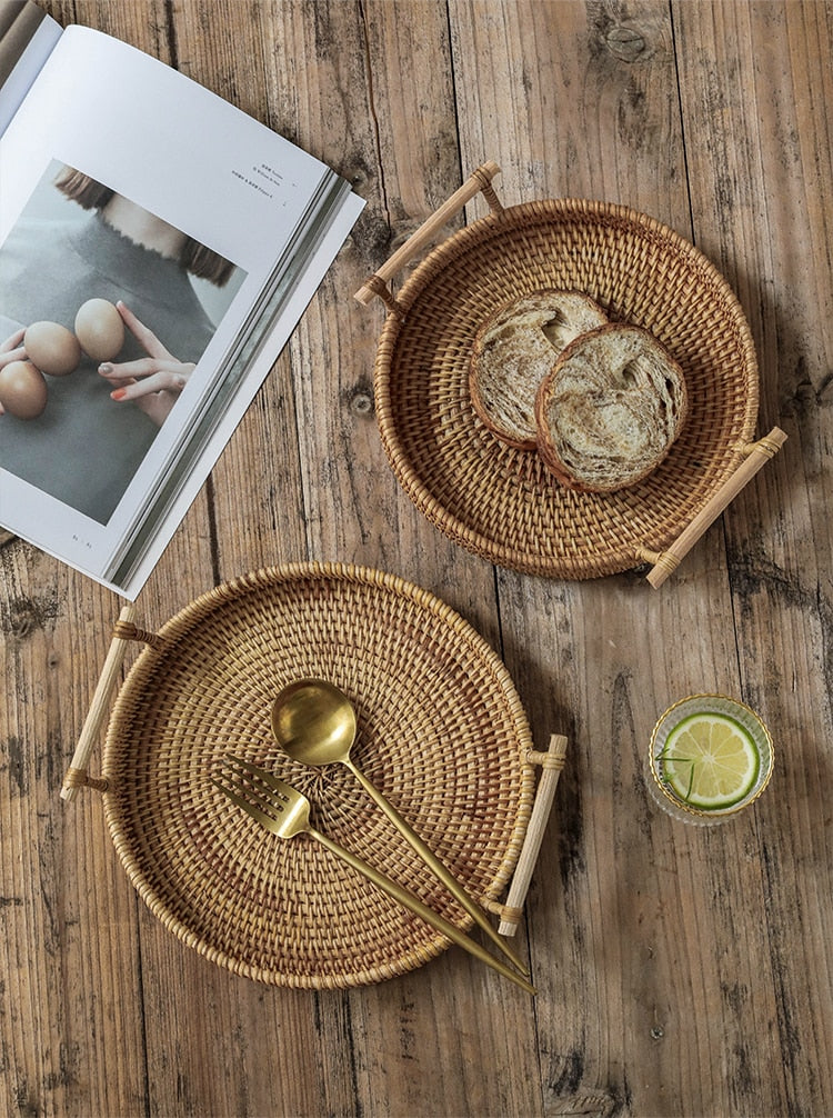 Round rattan tray with solid wood handles – shown in a room setting (3)
