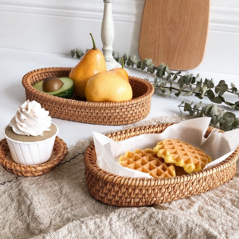 Oval genuine rattan tray with side handles – shown in a room setting (3)