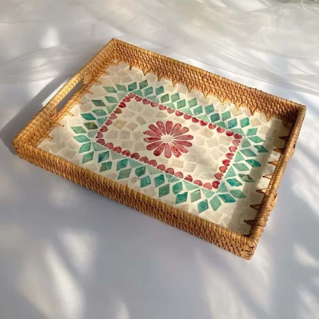 Rectangular rattan tray with a bright red floral base