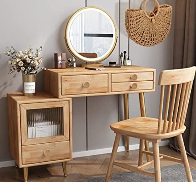 Natural wood and braided rattan drawer pull with soft curves – shown in a room setting