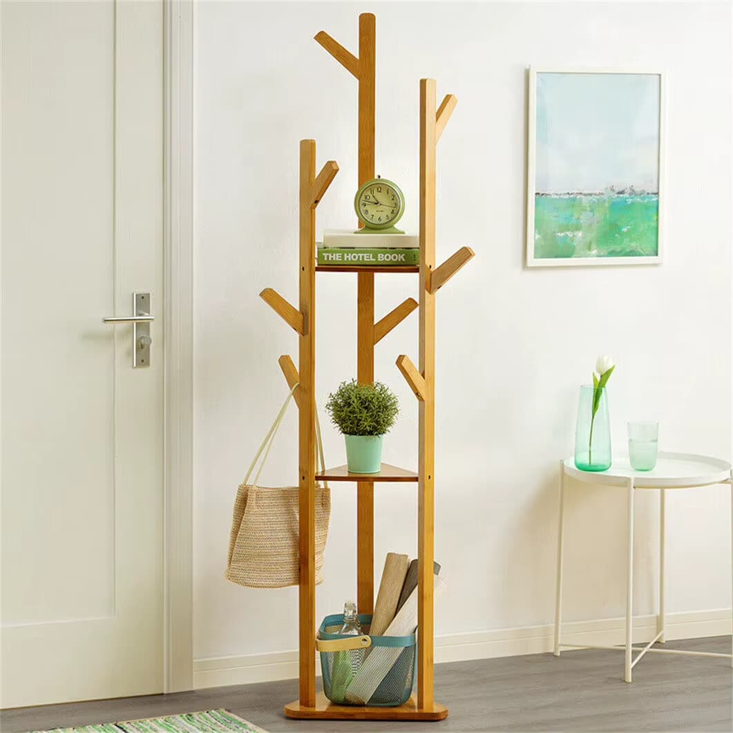 Bamboo clothing rack standing on a three-foot tripod base – shown in a room setting