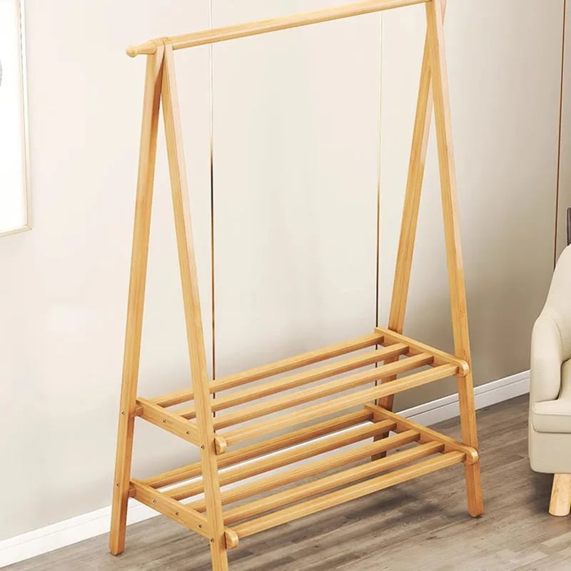 Two-tier wood and bamboo clothing rack with staggered rails
