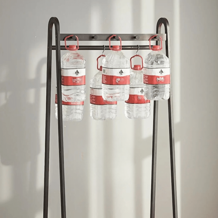 Matte black bamboo clothing rack with straight Chinese-inspired lines – shown in a room setting (2)