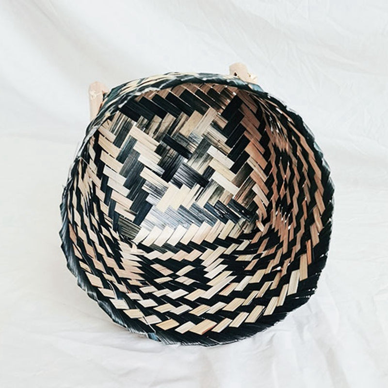 Slender two-tone black and natural rattan planter – close-up detail