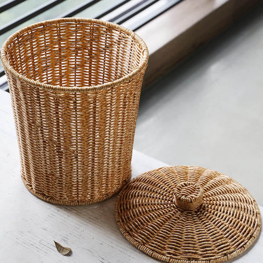 Compact hand-braided rattan trash can with a fitted lid