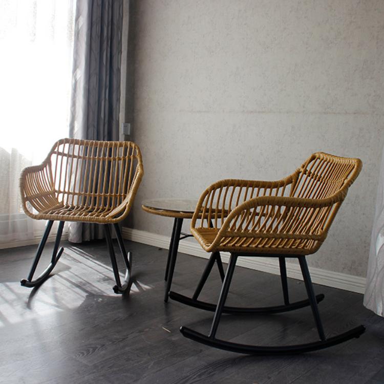 Light honey rattan rocking chair with soft curves – shown in a room setting (3)