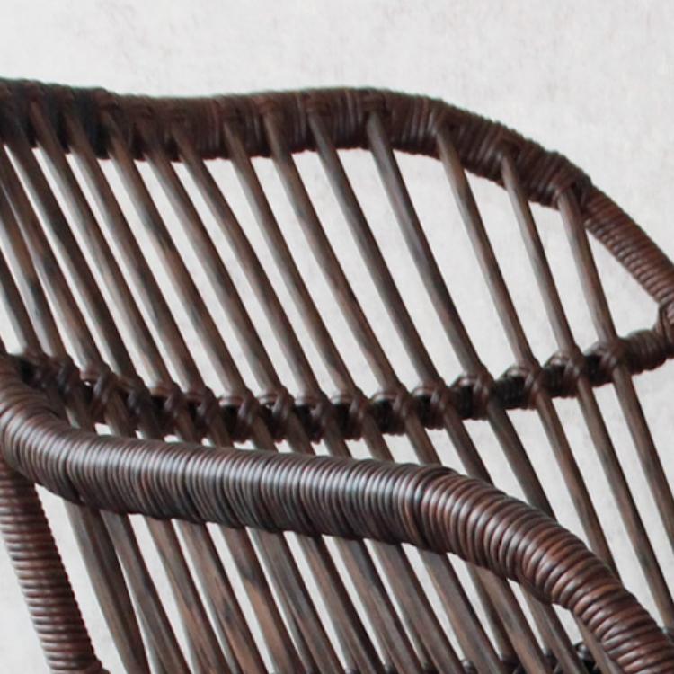 Dark brown hand-braided rattan rocking chair – close-up detail