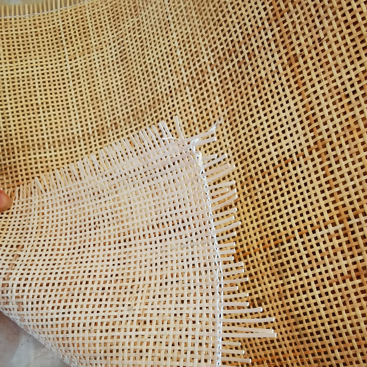 Square mesh rattan cane webbing roll – close-up detail