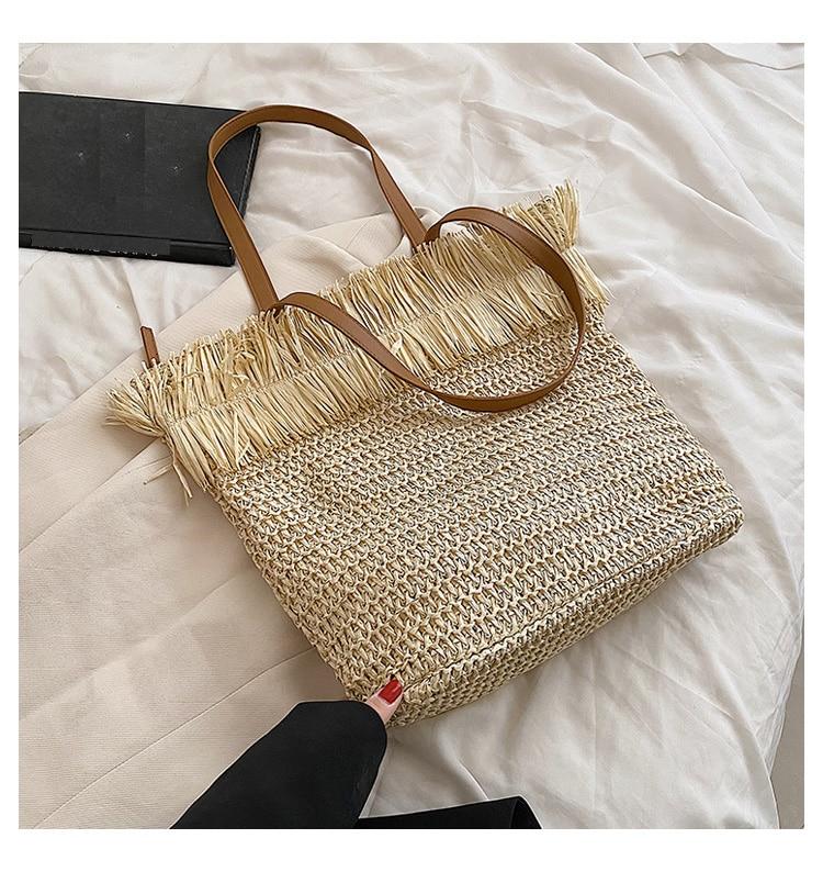 Large white straw crossbody bag with fringe trim
