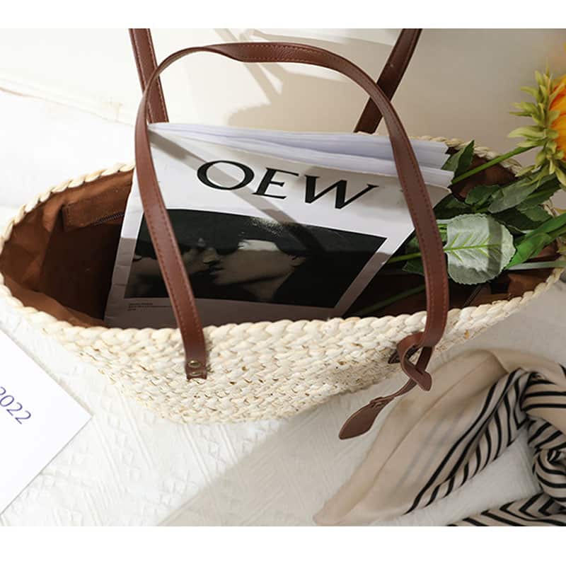 Handwoven straw summer bag with knotted brown handles – another view