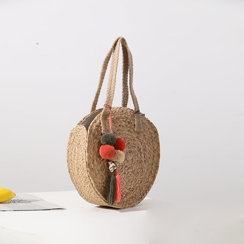Round woven crossbody bag with a long strap – another view