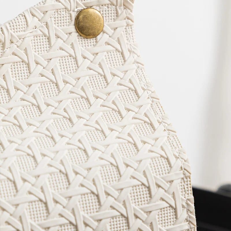 Modern rattan bag with faux leather trim – close-up detail