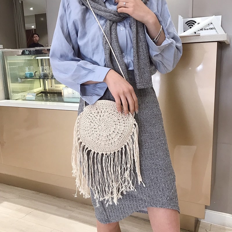 Boho crossed-weave rattan crossbody bag – worn by a model