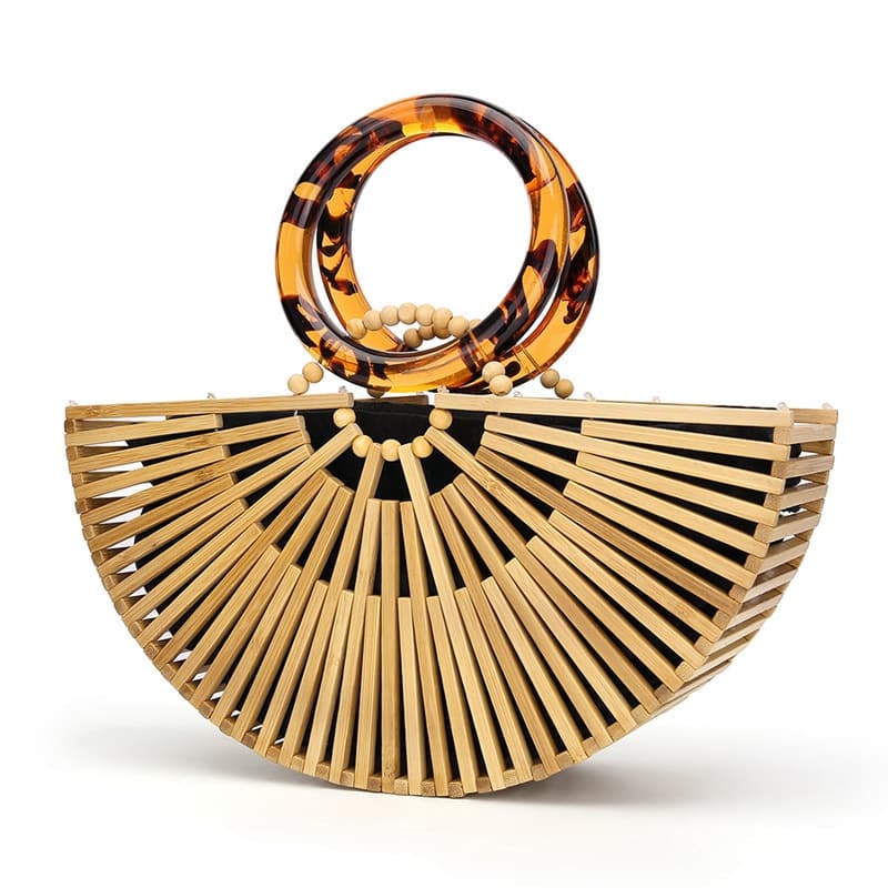 Carved wood handbag with woven accents