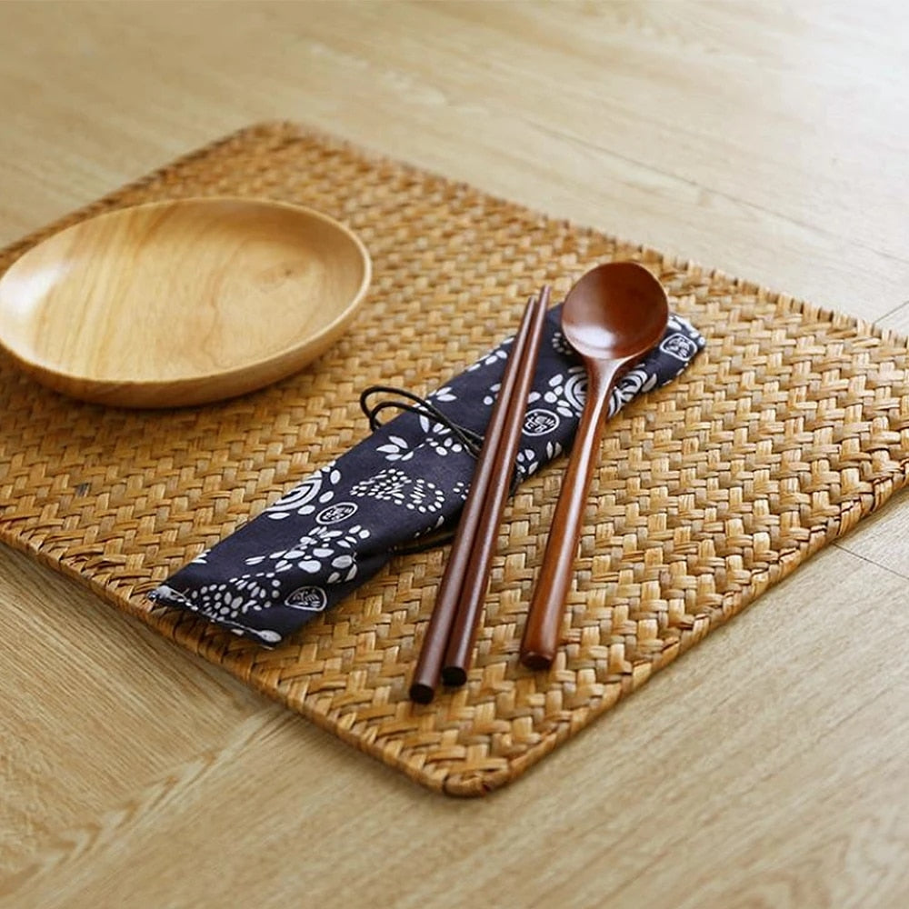 Rectangular handwoven seagrass placemat – shown in a room setting (2)