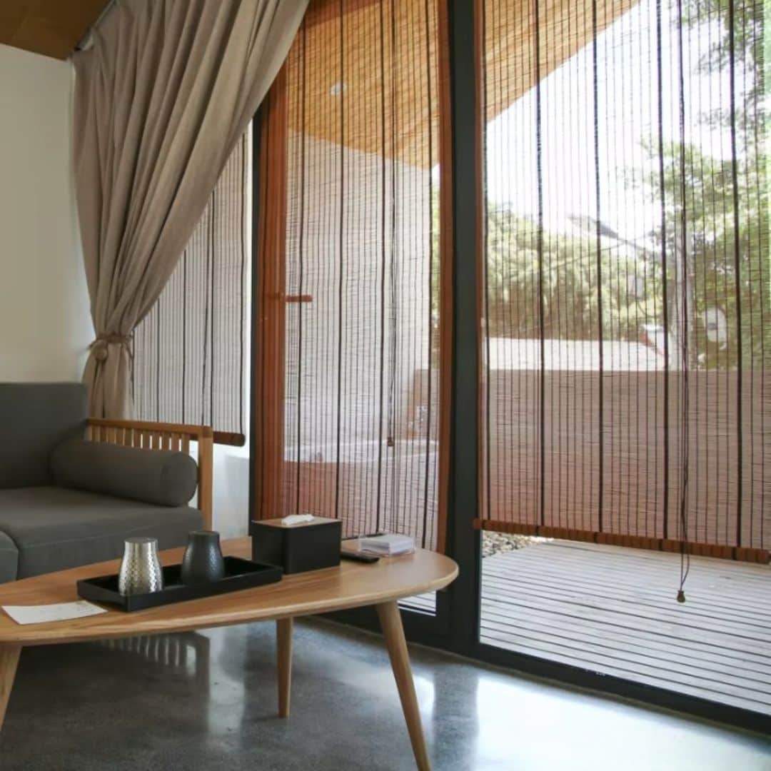 Fine translucent bamboo shade casting soft shadows – shown in a room setting