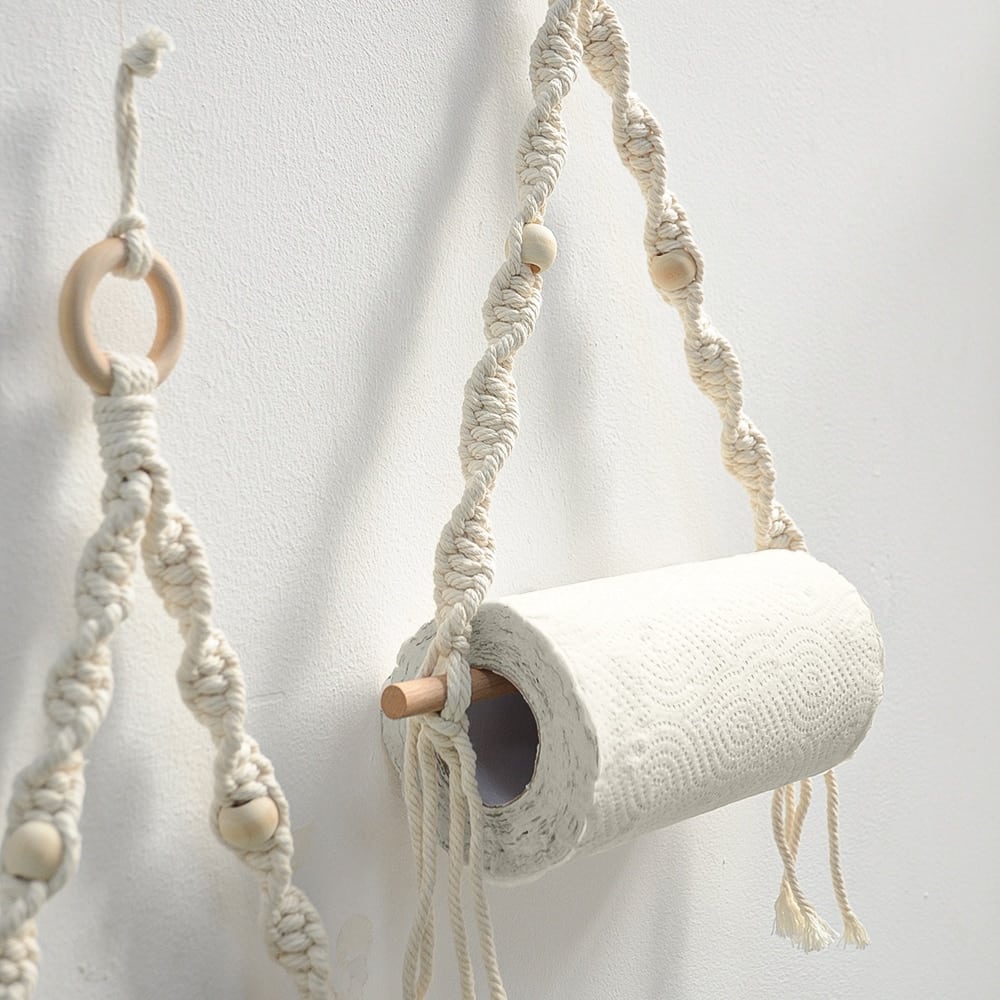 Round boho woven wall hanging on a natural wood frame – close-up detail