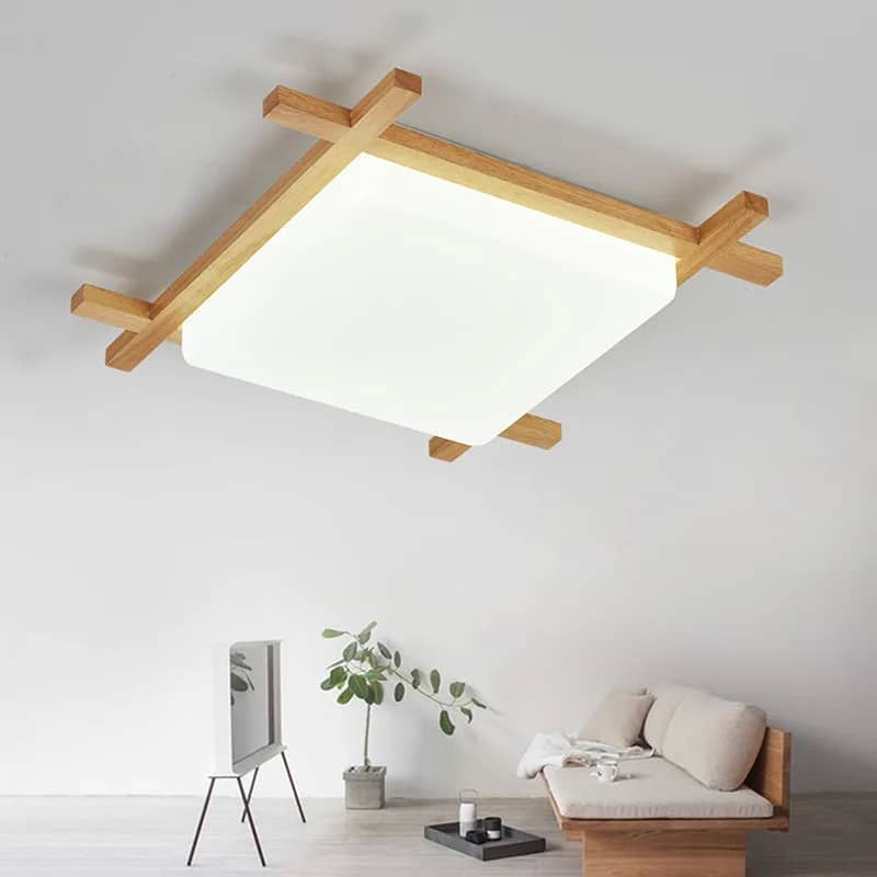 Square wood pendant light – shown lit in a room setting