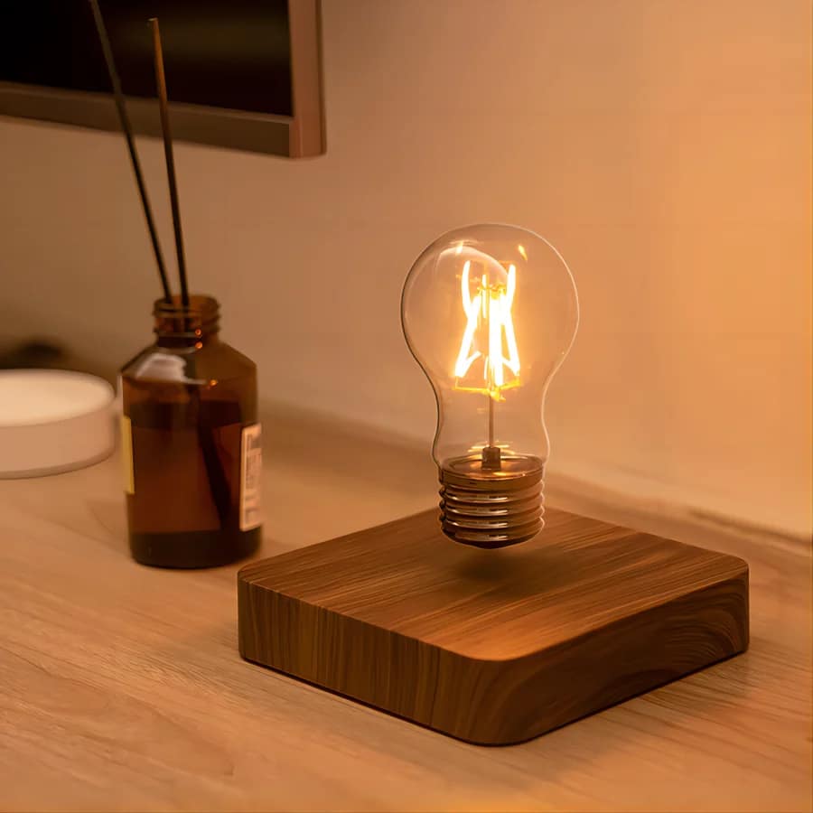 Levitating wood pendant light – shown lit
