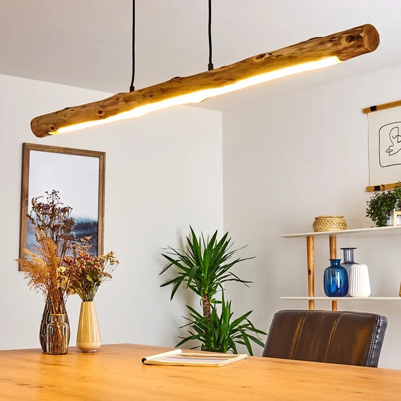 Driftwood log LED pendant light – shown in a room setting