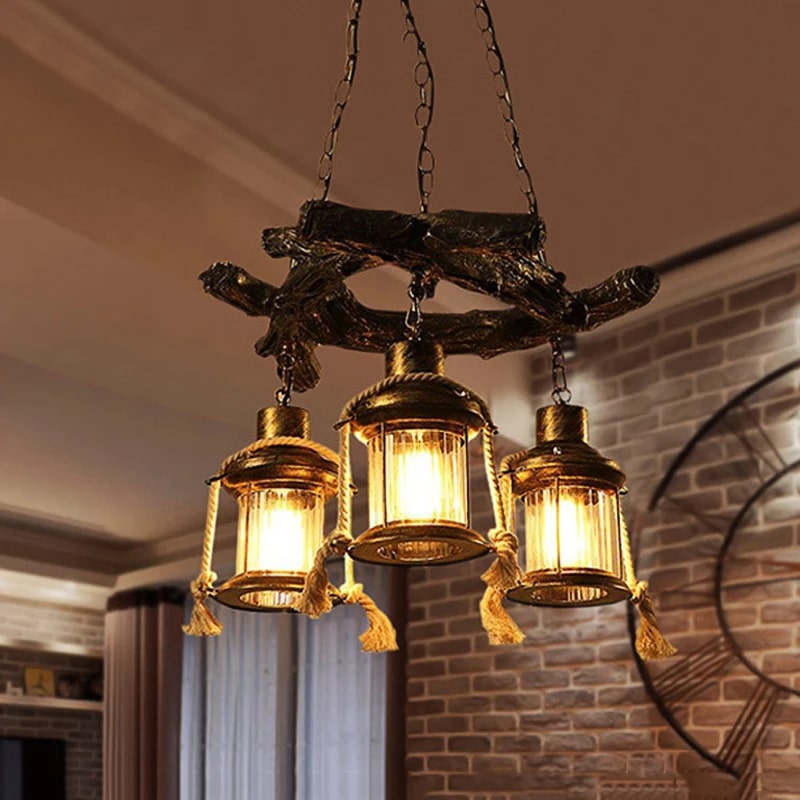 Industrial driftwood and iron pendant light – shown lit in a room setting (2)