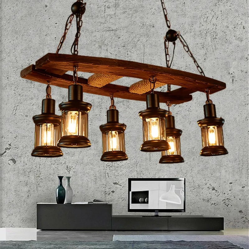 Driftwood branch chandelier with six blown glass lanterns – shown lit