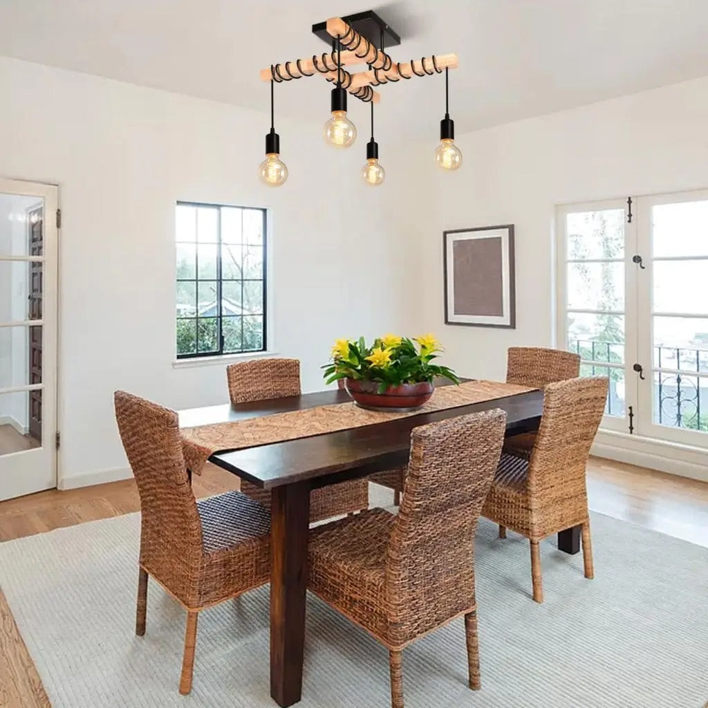 Industrial four-head wood and metal pendant light – shown in a room setting