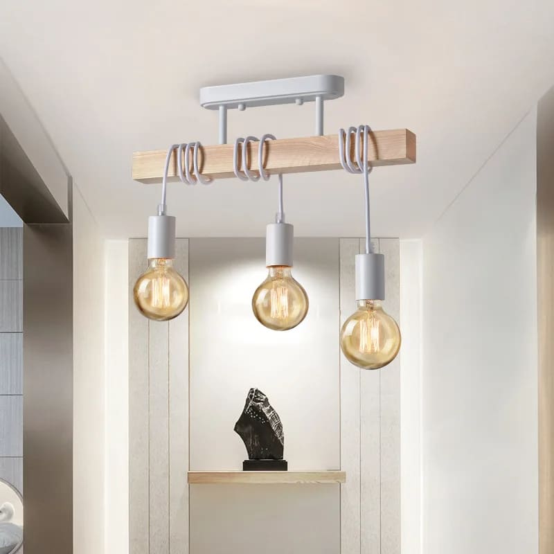 Retro wood and patinated metal Edison bulb pendant – shown in a room setting (2)