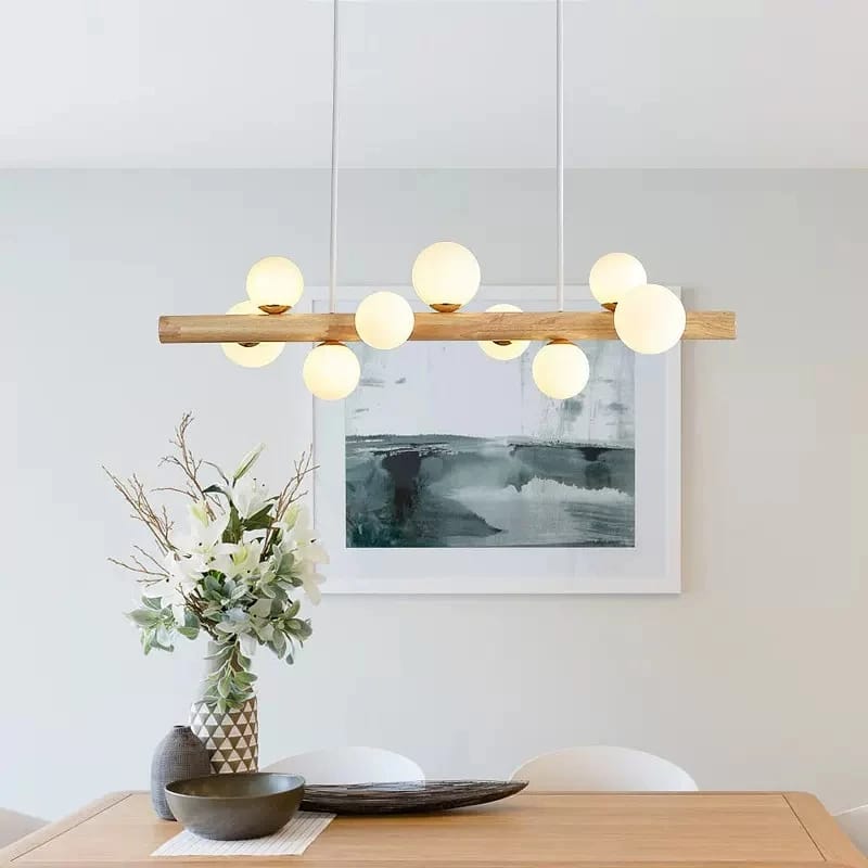 Minimalist concentric wood ring pendant light – shown in a room setting