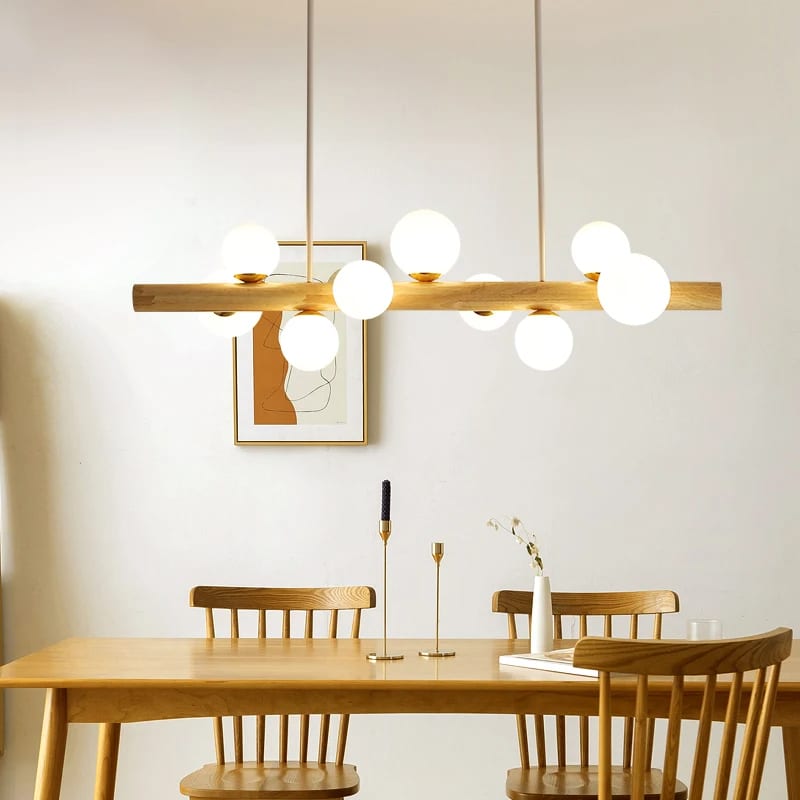 Minimalist concentric wood ring pendant light – shown in a room setting (2)
