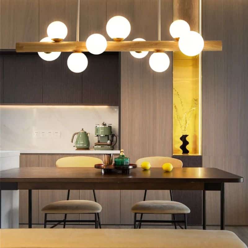 Minimalist concentric wood ring pendant light – shown lit in a room setting