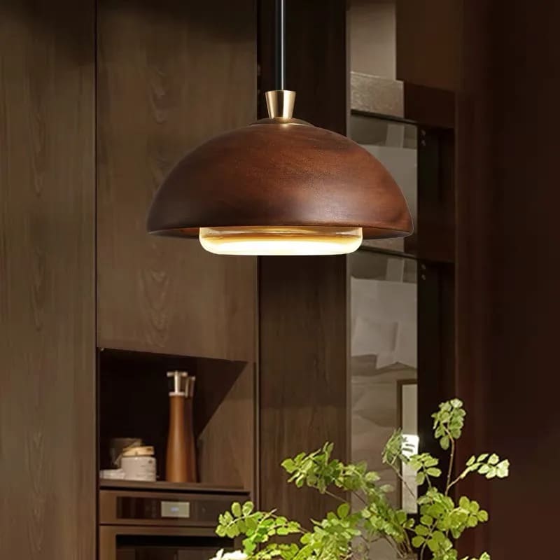 Nordic woven wood pendant light – shown lit in a room setting
