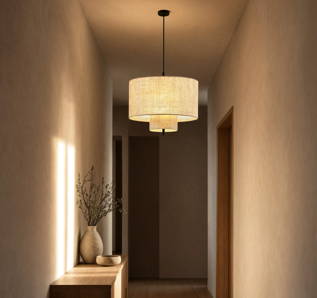 Positano double drum beige fabric pendant light – shown in a hallway