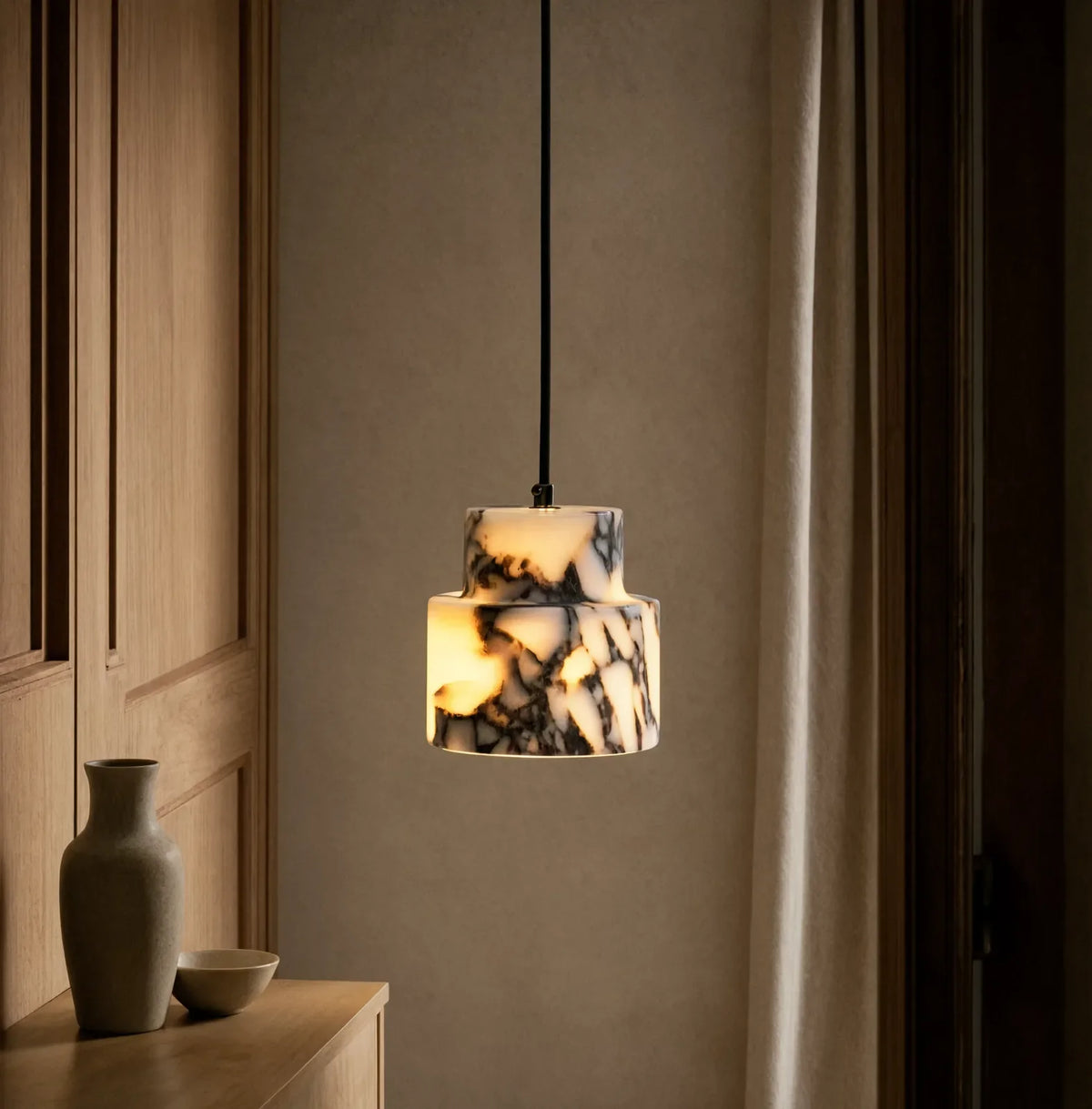 Héraclée two-tier white marble pendant light – shown in an entryway