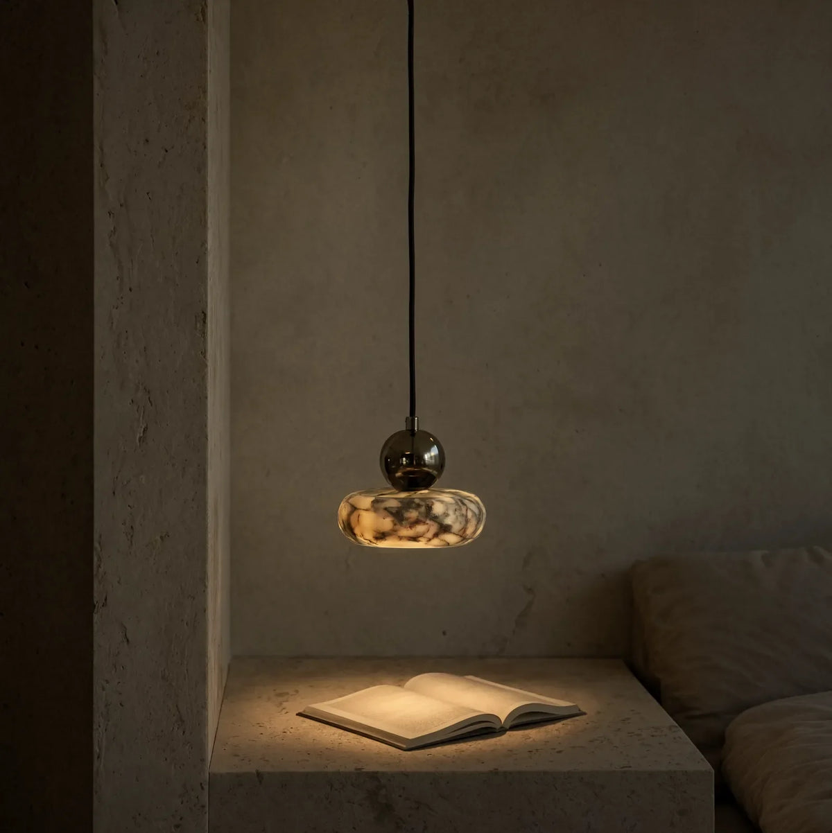 Métaponte marble pebble pendant light – shown in a room setting