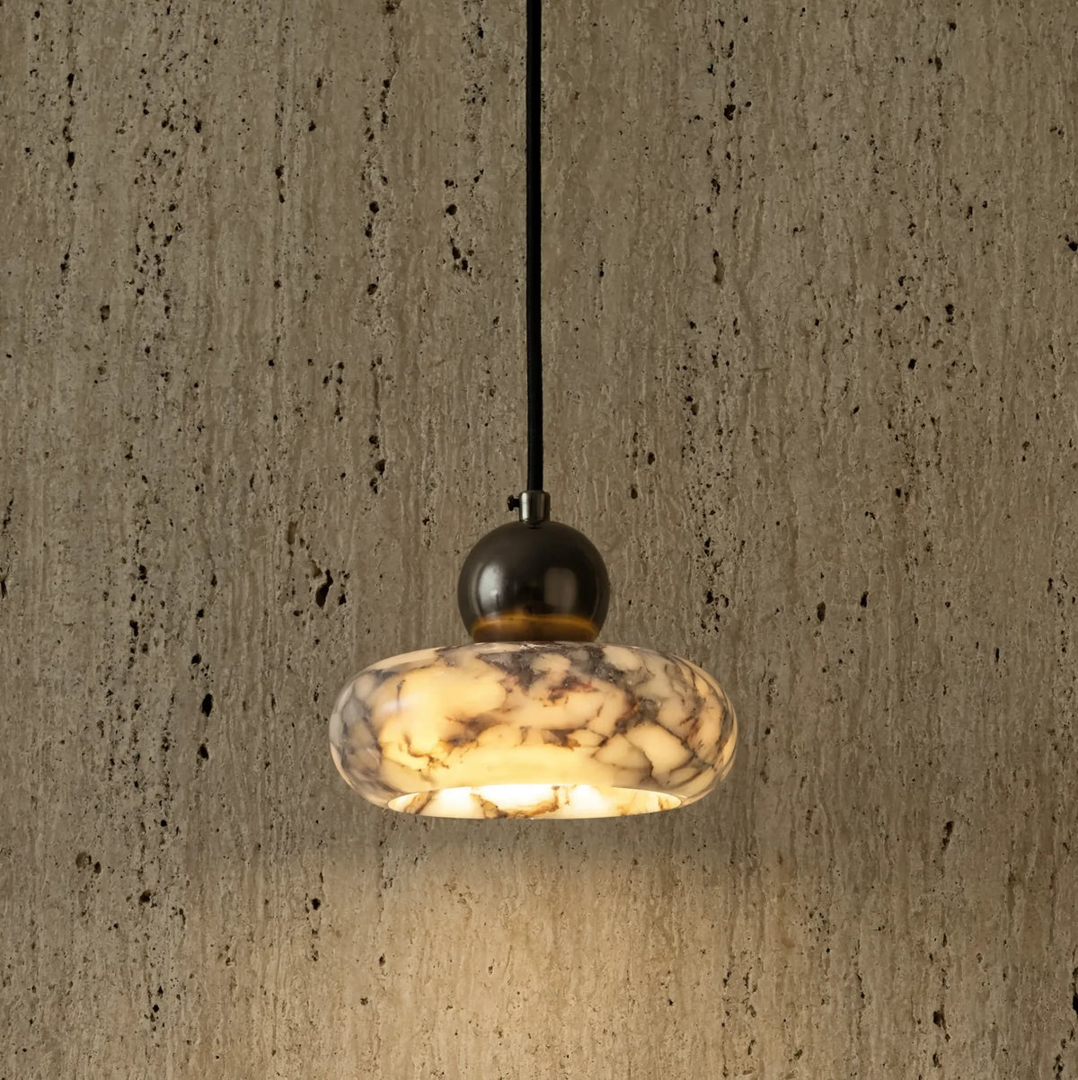 Métaponte marble pebble pendant light – shown in a room setting (2)