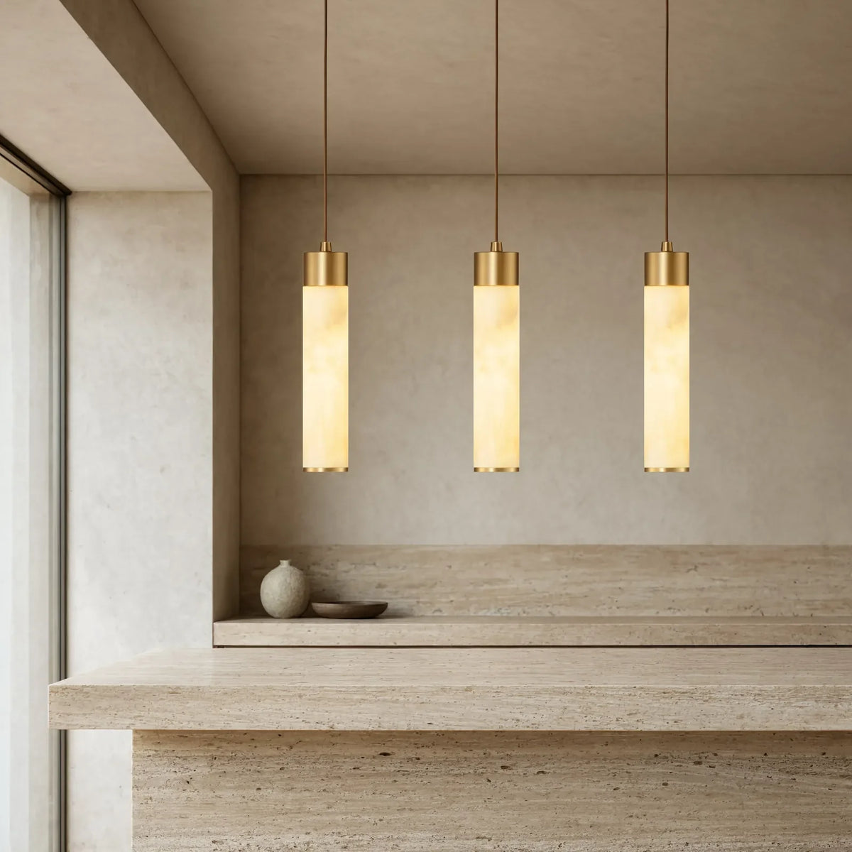 Gela honey marble and brushed brass pendant light – shown in a kitchen
