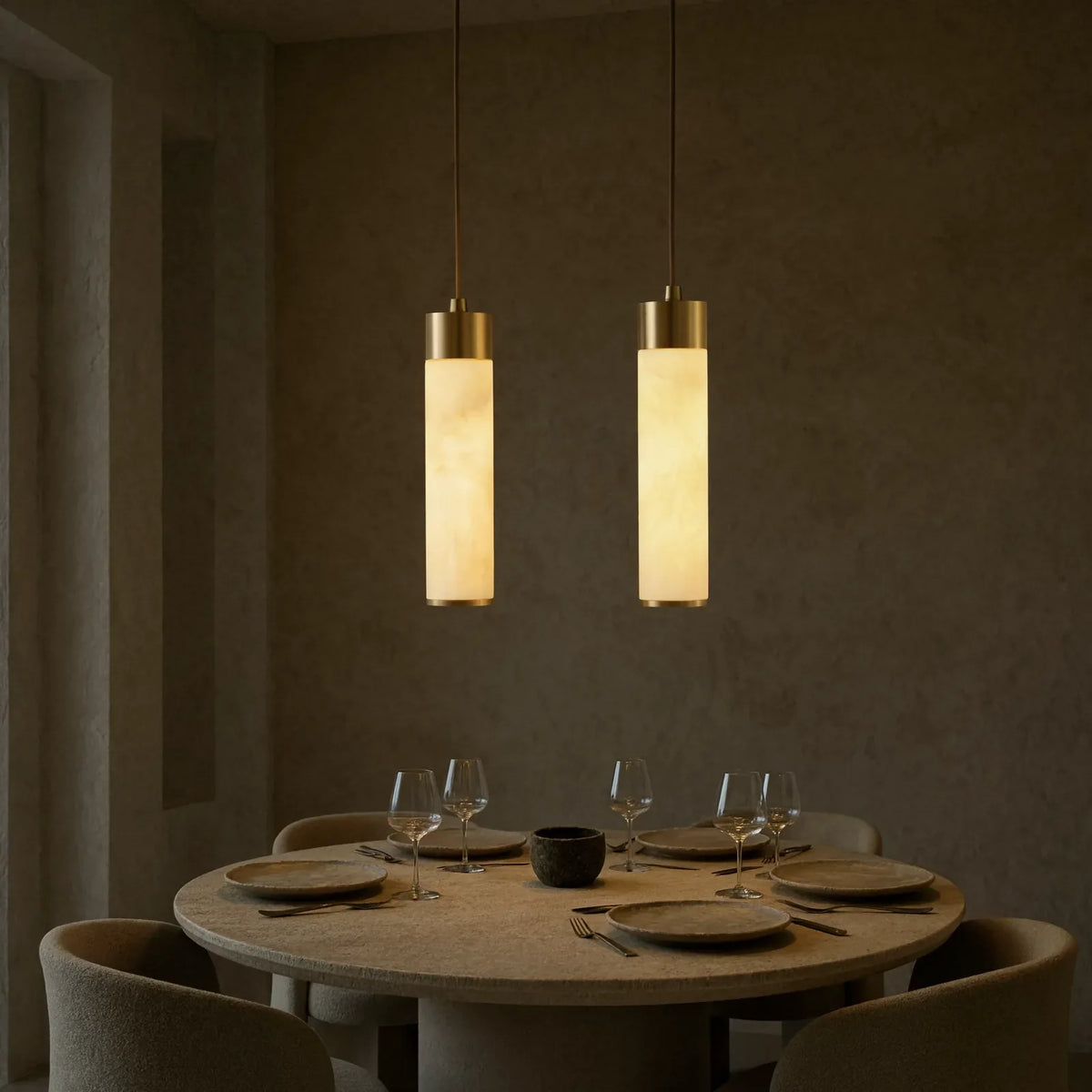 Gela honey marble and brushed brass pendant light – shown in a dining room