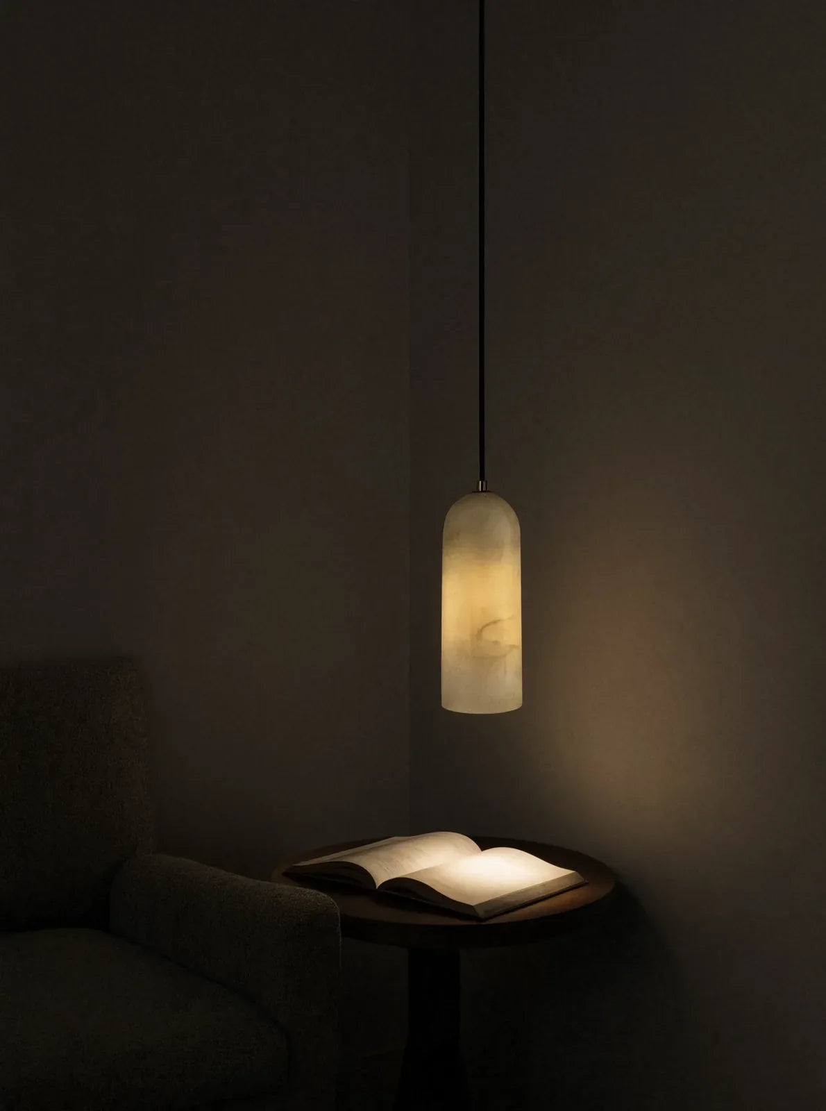 Tarente translucent marble pendant light with brushed brass canopy – shown in a room setting (3)