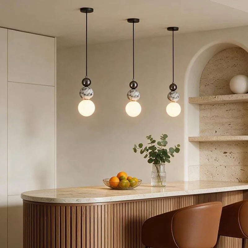 Locres marble and opal glass globe pendant light – shown in a kitchen