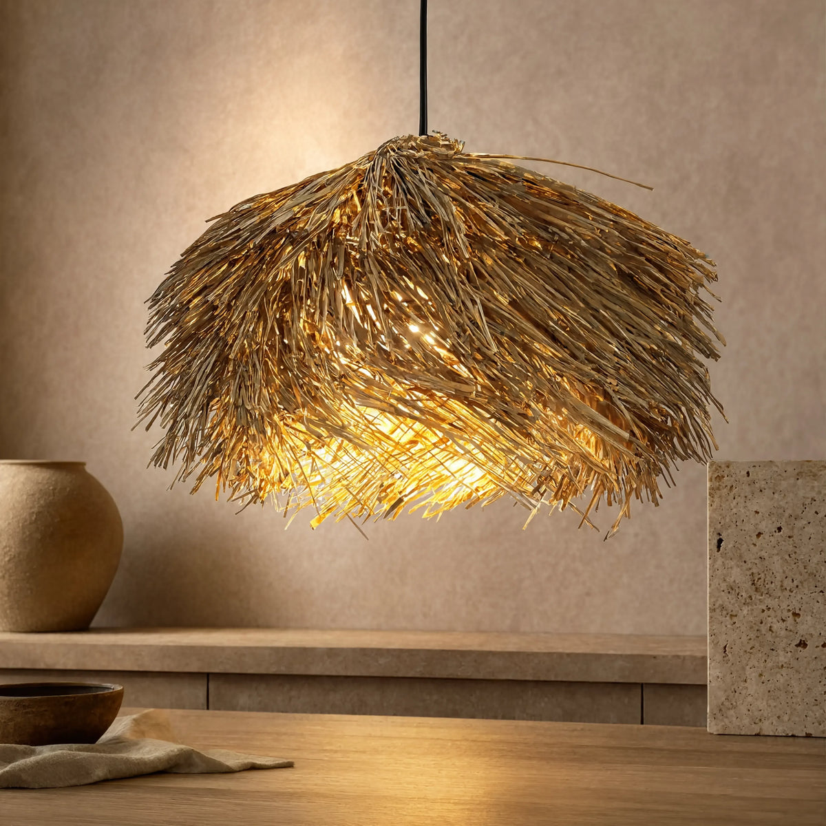 Chios thatched rattan fringe pendant light – shown lit in a room setting