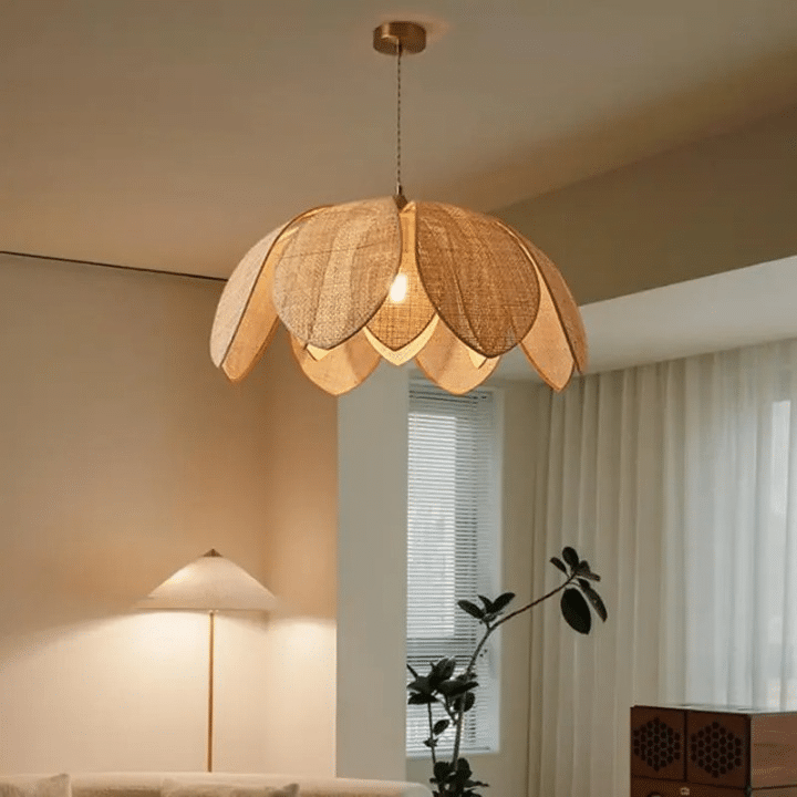 Chinese-style flared rattan petal LED pendant light on an iron frame – shown in a room setting (2)