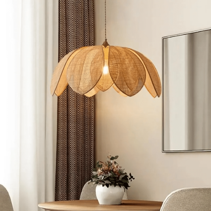Chinese-style flared rattan petal LED pendant light on an iron frame – shown in a room setting