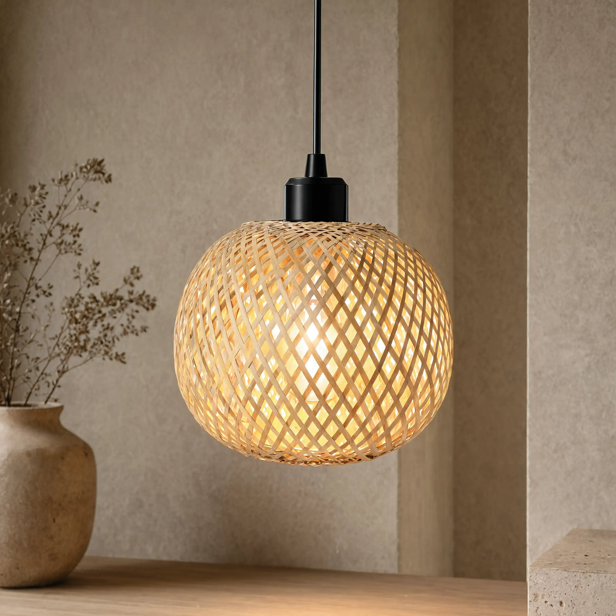 Andros handwoven rattan ball pendant light – shown in a room setting