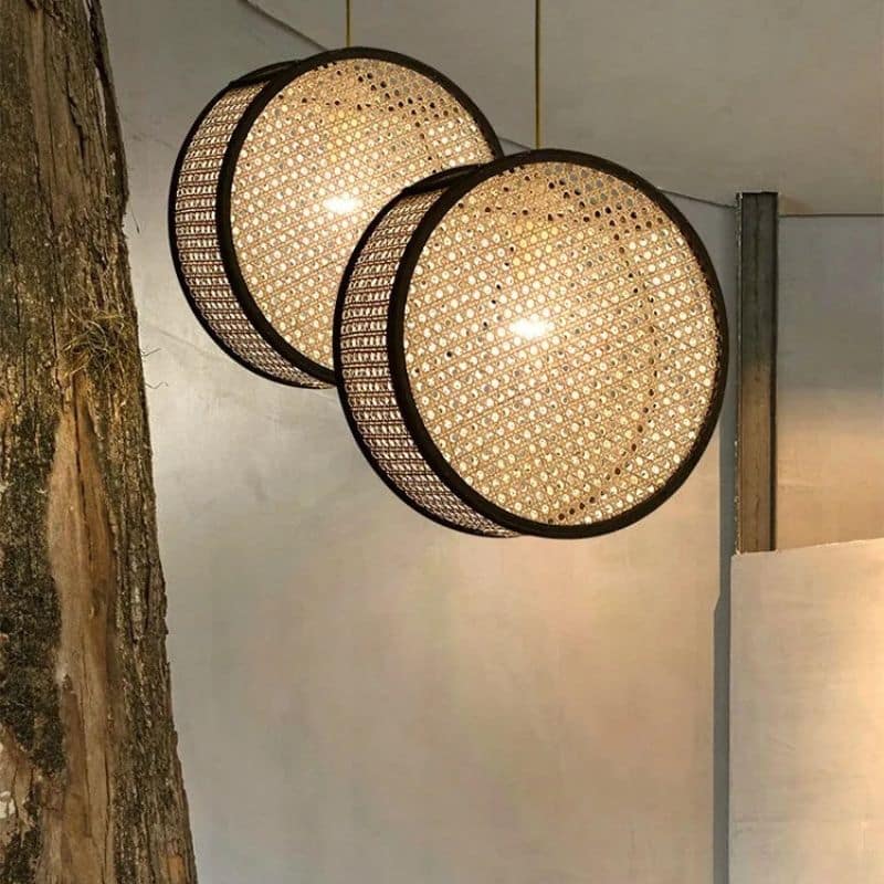 Modern openwork geometric rattan pendant light – shown in a room setting (2)