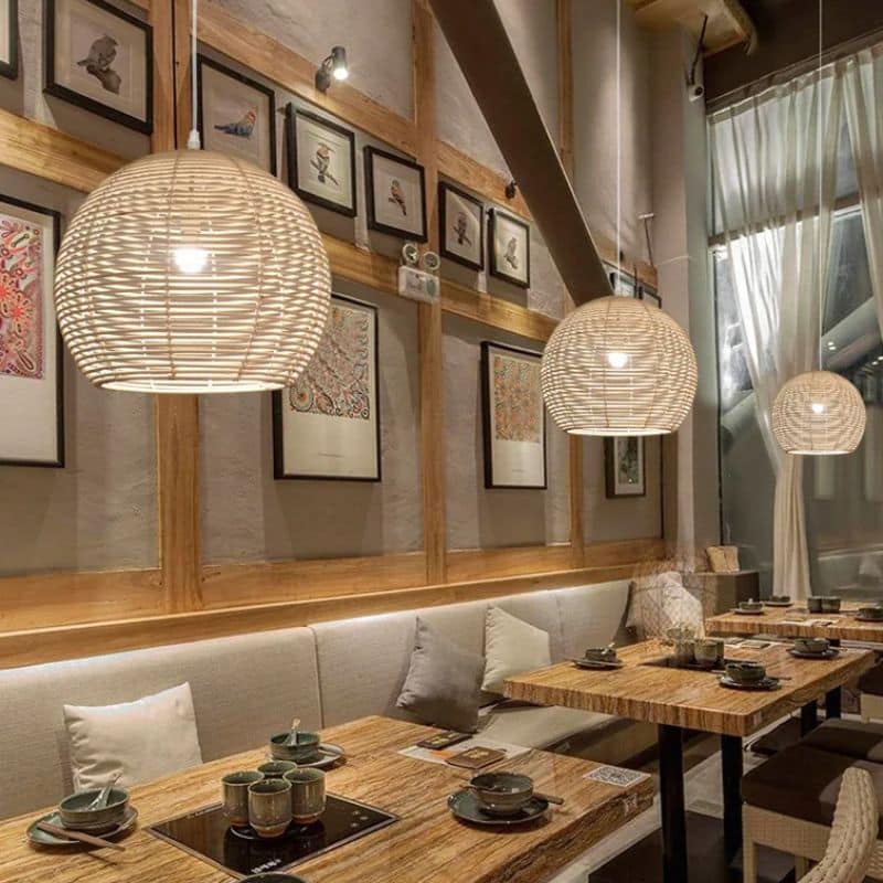 Chinese-style round ribbed rattan LED pendant light – shown in a room setting
