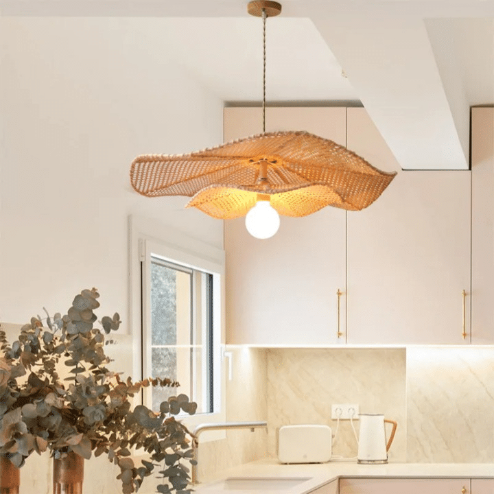 Vintage handmade round rattan pendant light with concentric circles – shown in a room setting