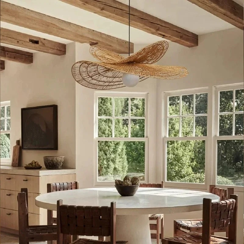 Retro round tight-weave rattan LED pendant light – shown in a room setting